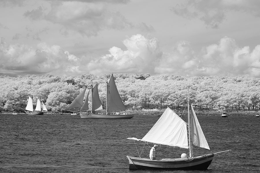 Infrared Photo of Small Boat in Front of Schooner in Gloucester Outer Harbor.